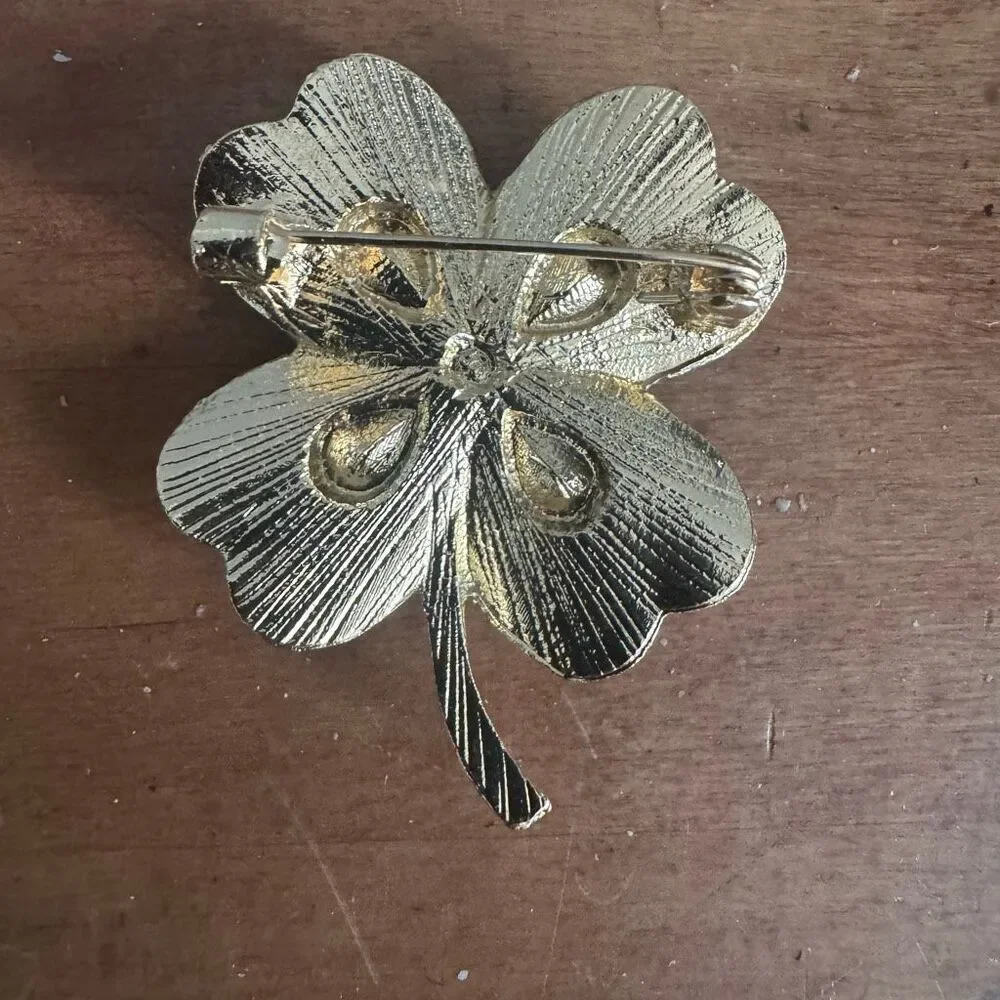 Gold Tone Four Leaf Clover Brooch With Stones Approximately